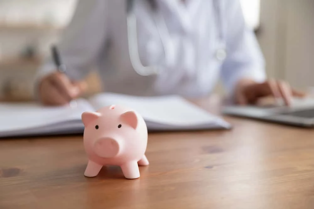 A workers' compensation doctor in NYC evaluating an injured patient, focusing on accurate diagnosis, treatment, and documentation for workplace injury claims.
