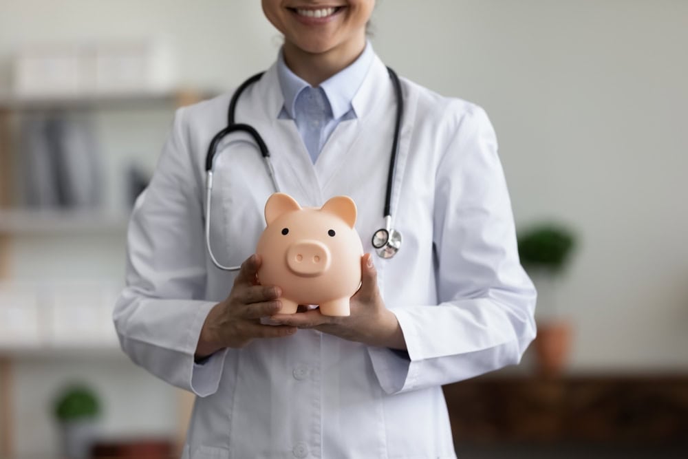 A professional doctor in NYC standing in a clinical or hospital setting, representing expert medical care and patient-focused treatment in New York City.